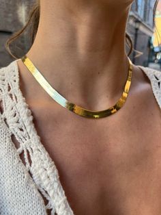 A thick, solid gold herringbone chain necklace. The perfect bold piece to elevate any look.-7mm width -length: 17" -19 grams Gold Herringbone Necklace, Gold Herringbone Chain, Herringbone Chain, Herringbone Necklace, Herringbone, Solid Gold, Chain Necklace, Yellow Gold, Chain