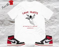 Express your style and emotion with the "Love Hurts" shirt, designed to match the Air Jordan 1 High OG Black Toe Reimagined (DZ5485-106). This premium Bella Canvas unisex tee offers the perfect blend of comfort and streetwear style, making it a must-have for sneakerheads who appreciate the iconic Black Toe colorway. Whether you're stepping out or relaxing, this shirt keeps you looking fresh while adding a bold statement to your outfit. Features: *Color Match: Designed to complement the black, re Streetwear Fits, Popular Sneakers, Jordan 1s, Jordan 1 High Og, Sneaker Release, Love Hurts, Streetwear Style, Air Jordan 1 High, Jordan 1 High