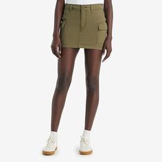 Your favorite cargo-in skirt form. With an ultra-flattering mid-rise and an above-the-knee length cut, our mini cargo skirt features oversized patch pockets and an effortless '90s style.Front Style: Flat FrontFeatures: Fly FrontClosure Type: Button, ZipperClosure Location: FrontPockets: 2 Cargo Side PocketsRise: Mid RiseApparel Length: 13 InchesFiber Content: 100% CottonLining: UnlinedSkirt Length: Short LengthCare: Machine Wash, Tumble DrySkirt Type: Denim SkirtsCountry of Origin: Imported Fitted Denim Skirt With Cargo Pockets, Spring Mid-rise Cargo Skirt, Relaxed Fit Mid-rise Skirt With Pockets, Fitted Mid-rise Cotton Cargo Skirt, Fitted Denim Skirt With Cargo Pockets For Spring, Mid-rise Skirt With Pockets And Relaxed Fit, High Waist Utility Cargo Skirt, Fitted High Rise Cotton Cargo Skirt, Fitted High-rise Cotton Cargo Skirt