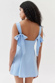 UO Bri Double Bow Satin Mini Dress | Urban Outfitters Cocktail A-line Mini Dress With Bow, Sweetheart Neckline Mini Dress With Tie Back, Spring A-line Mini Dress With Bow Straps, Flirty Mini Dress For Bridesmaids, Backless Mini Dress With Tie Back For Bridesmaid, Chic Mini Dress With Sweetheart Neckline And Tie Back, Elegant Summer Mini Dress With Satin Bow, Elegant Mini Dress With Satin Bow For Summer, Evening A-line Mini Dress With Satin Bow