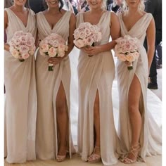 the bridesmaids are all dressed in different styles and colors, with their bouquets