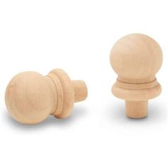 two wooden knobs on white background