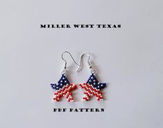 two red, white and blue beaded stars are hanging from silver earwires