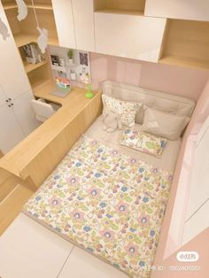 a small bedroom with a bed, dresser and shelves in the back ground is an open closet