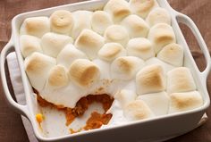 a casserole dish with marshmallows in it