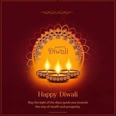 happy diwali greeting card with three lit candles in the center and an intricate design on