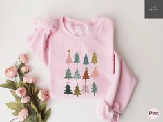 "Christmas Trees Shirt, Christmas Shirts for Women, Christmas Tee, Merry Christmas , Shirts For Christmas, Cute Christmas Shirts, Holiday Tee 📢Please Check All Photos For Details.   📢Choose Your T-Shirt Size From The Drop-Down Lists Next To The item Picture   📢Choose Of Your T-Shirt Color From The 2nd Picture   📢Use \"Add message to Seller\" link On The Checkout Page To Send me the Following important Details For Your Order's Customization.   📢Shipping Time Varies by location (we are locate Chic And Classy Outfits, Pink Tree Christmas, Faded Blue Jeans, Dreaming Of A Pink Christmas, Christmas Tree Sweater, Cute Christmas Sweater, Ros Gold, Sweaters Winter, Holiday Sweaters