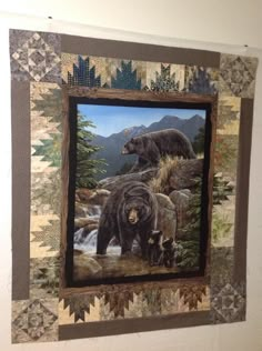 a painting on the wall of a bear family