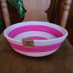 Pink and white rope bowl with brown tag reading Laughing Girl Design on a wooden chair Rope Bowl With Embroidery, Rope Bowls, Cotton Rope, Stay Organized, Small Batches, Staying Organized, Pink And White, Design Crafts, Declutter