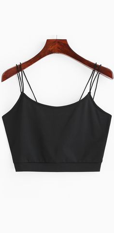 In a brief solid-color hue, this casual tank top features skinny straps, an alluring cropped length, in a comfy fit. Pair it with high-waisted pants or shorts to create a simple modern look. Black Cami Top, Mini Robes, Mini Dress Casual, Black Khakis, Casual Tank Tops, Cami Top, Cami Tops, High Waisted Pants