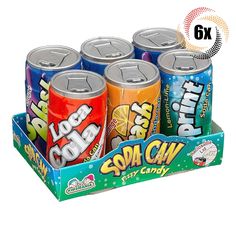 six cans of soda are in a display box with the label below it for sale