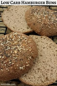 three loaves of low carb hamburger buns on a cooling rack with text overlay