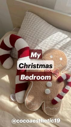 two stuffed gingerbreads on a bed with the words my christmas bedroom above them