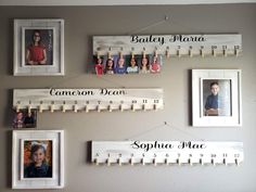 several family photos hanging on a wall with clothes pins and pegs attached to them