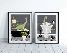 two framed posters with dinosaurs in bathtubs