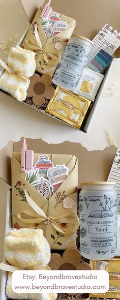 two boxes filled with different types of paper and crafting supplies next to each other