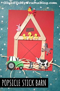 popsicle stick barn craft for kids to make with construction paper and construction toys on top