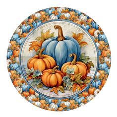 a decorative plate with pumpkins and leaves on the front, painted in acrylic paint