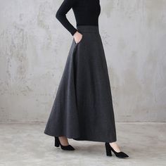 "This winter wool skirt is a classic piece of tailoring that will see you through rain or shine. It is cut with a flattering flared skirt to give you a wonderful shape. The winter skirt is perfect classic styling and ends at the ankle. This is a versatile skirt that you'll wear again and again. DETAILS: * 30% wool, 30% fiber, 40% polyester * fully satiny liner * Two side pockets * Right zip closure * A little Back elastic, comfortable wear * Plus size full skirt * Ankle length skirt * Perfect fo Elegant A-line Bottoms For Winter, Winter Solid Lined Skirt, Solid Winter Bottoms With Lined Skirt, Winter Solid Color Lined Skirt, Relaxed Fit Wide Leg Winter Skirt, Winter Workwear Maxi Skirt With Lining, Winter Workwear Lined Maxi Skirt, Winter Full Skirt Bottoms With Pockets, Lined Maxi Skirt For Winter Workwear