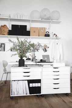 an image of a white dresser with drawers and shelves in the background, on instagram