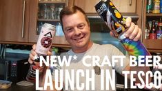 a man holding up two cans of beer in his hand with the caption new craft beer launch in tesco