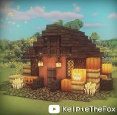 an image of a house made out of blocks and barrels in the grass with text that reads kelpetethefox