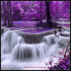 a waterfall with pink water flowing down it