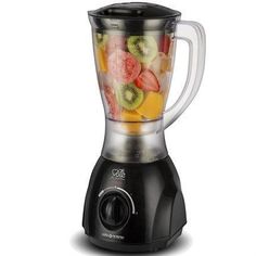 a blender filled with lots of different types of fruit