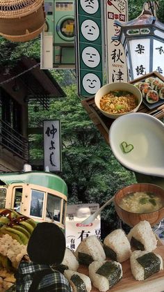 an assortment of food items displayed on a wooden table in front of trees and signs