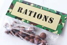 chocolate candies wrapped in cellophane with the word congratulations printed on it and camouflage print wrapper