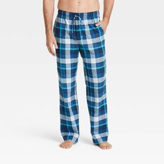 Stay comfortable through the night with these Plaid Flannel Pajama Pants from Goodfellow & Co™. These ankle-length pajama pants are crafted from cotton flannel fabric in a regular fit for breathable comfort. A full elastic waistband with a front drawstring offers adjustable wear, while two side pockets lend functional flair. Designed with a classic plaid print, you can pair them with tanks or sleep shirts for different sleepwear options. Goodfellow & Co™: Feel good in what you wear, anywhere. Mens Plaid Flannel, Flannel Pajama Pants, Flannel Pajamas, Pajama Robe, Mens Plaid, Print Pajamas, Sleep Shirt, Pajama Bottoms, Flannel Fabric