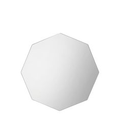 a white hexagonal mirror on a white background