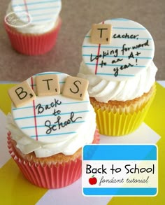 two decorated cupcakes with writing on them