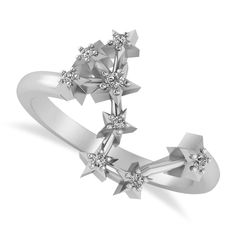 a white gold ring with stars and diamonds