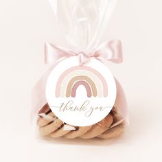 a bag filled with cookies and a thank you tag on the top of each cookie