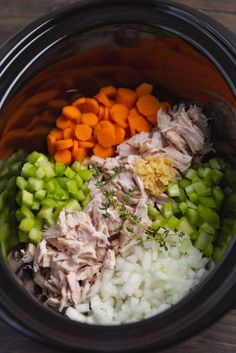 the food is prepared and ready to be cooked in the crock pot for dinner