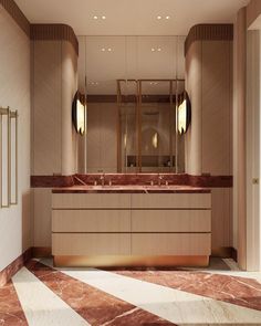 a large bathroom with marble floors and gold fixtures on the wall, along with two sinks