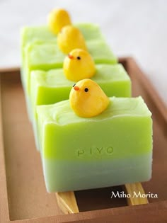 four soap bars with yellow chicks on them