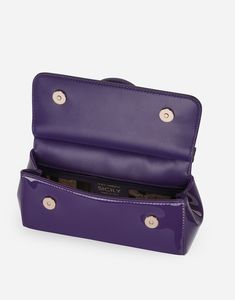 Small patent leather Sicily bag: Purple Front flap with hidden double magnetic fastening Logo tag featuring two metal plating finishes Top handle and adjustable, detachable strap in patent leather Printed fabric lining and flat pocket Item comes with a branded dust bag Measurements: 13 x 19 x 6 cm Made in Italy Elegant Patent Leather Bag With Glossy Finish, Classic Evening Bags In Patent Leather, Classic Patent Leather Evening Bags, Evening Bags With Detachable Handle In Patent Leather, Luxury Glossy Finish Shoulder Bag, Glossy Patent Leather Rectangular Bag, Luxury Patent Leather Bags For Formal Occasions, Classic Patent Leather Bag For Formal Occasions, Classic Patent Leather Formal Bag