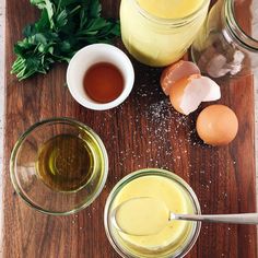 ingredients to make an egg salad laid out on a cutting board