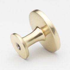 an image of a brass knob on a white background