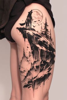 a woman's thigh with a wolf on top of a mountain and trees in the background