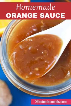 homemade orange sauce in a glass jar with spoons on the side and text overlay that reads homemade orange sauce