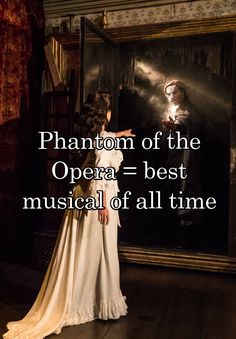 a woman standing in front of a mirror with the words, phantom of the opera - best musical of all time