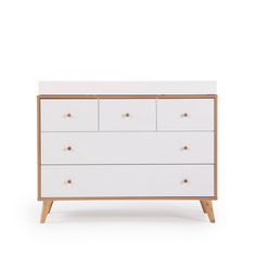 a white dresser with wooden legs and drawers on it's side, against a white background