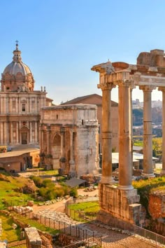 the ruins of an ancient city are shown in this photo, with columns and arches