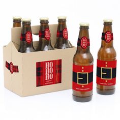 six bottles of aged 70 birthday beer in a cardboard box