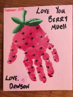 a valentine's card with a handprinted strawberry on it