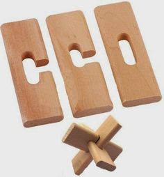 three pieces of wood are shown with one piece missing and the other part missing from it