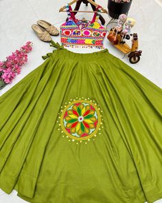 Designer Party Lehenga Choli Fully Stitched 👚BLOUSE🎉 🧶Febric: Cotton Silk 🪢Work: Embroidery work 👗Size: 38 Size but there is extra margin so can adjust upto 36" to 44" 📏Length: 16 📌Sleeves: Sleeve less 💃LEHENGA🎊 🧶Febric: Cotton Silk 🪢Work: Real Mirror and Embroidery work 👗Size: Supported upto 44" 📏Length: 42 Flair: 6 Mtr 📌Latkan: Yes Green Traditional Wear With Dori Work For Spring, Fitted Green Lehenga With Floral Embroidery, Green Choli With Resham Embroidery For Summer, Pista Green Choli With Floral Embroidery For Party, Green Floral Embroidered Sets For Festivals, Green Lehenga With Floral Embroidery For Navratri, Fitted Green Choli With Floral Embroidery, Green Sets With Floral Embroidery For Festivals, Festive Green Choli For Spring